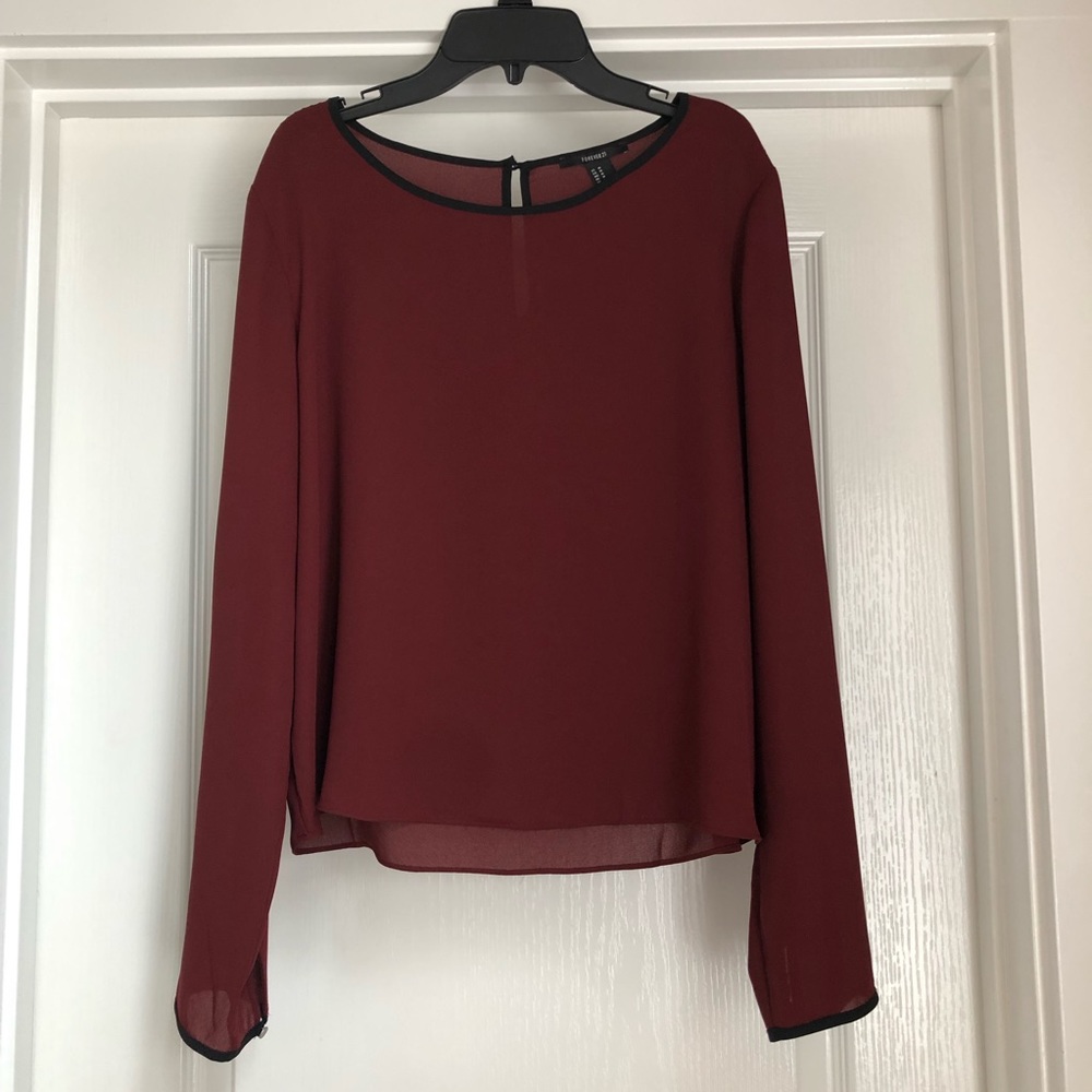 Maroon blouse.